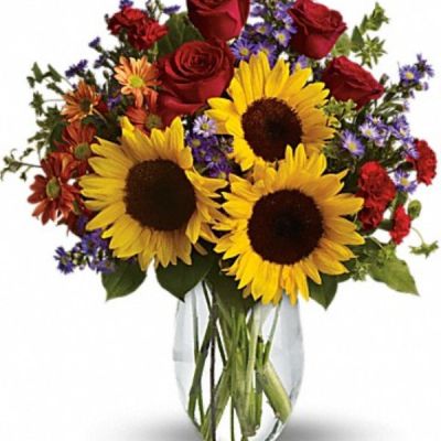 <div class="m-pdp-tabs-description">
<div id="mark-1" class="m-pdp-tabs-marketing-description">

<hr />

Pure happiness is what this pretty bouquet delivers - whether you're sending it for a fall birthday, Thanksgiving, thank you, or simply just because. Surely, no one can be in the presence of something so inherently happy and not smile.

</div>
</div>
<p id="arrngDescp">Sunny sunflowers, red roses and miniature carnations, bronze daisy spray chrysanthemums, large lavender monte cassino asters and autumn greens are beautifully arranged in a clear glass vase.</p>
