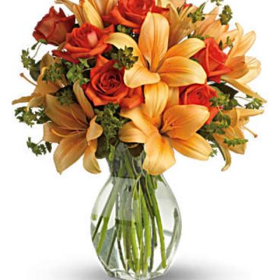 <div id="mark-3" class="m-pdp-tabs-marketing-description">Ignite their heart with this inspirational gift of warm orange roses and lilies. As wondrous as a summer sunset - but quite a bit more fragrant! - it's a versatile choice for men and women alike.</div>
<div id="desc-3">
<ul>
 	<li>Dark orange roses and asiatic lilies are mixed with fresh green bupleurum and variegated pittosporum.</li>
 	<li>Presented in a graceful glass reception vase.</li>
</ul>
</div>