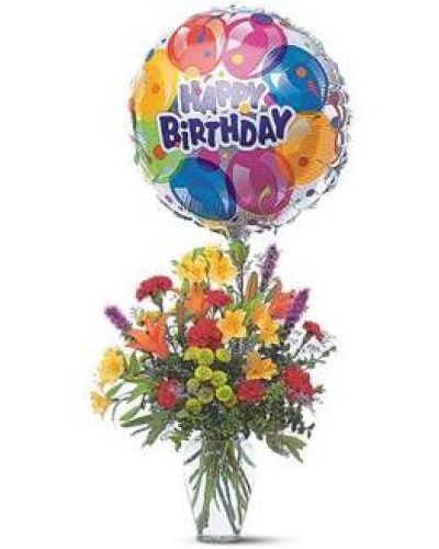 Take their birthday to brand new heights with this colorful arrangement of flowers and a high-flying birthday balloon.
Alstroemeria, carnations, chrysanthemums and lilies are delivered in a clear glass vase with attached foil balloon.