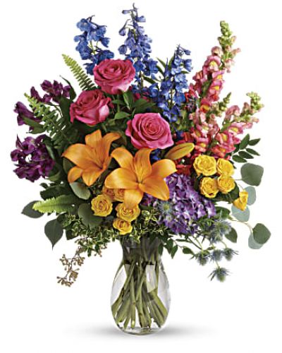 <div id="mark-3" class="m-pdp-tabs-marketing-description">A rainbow of beauty for any occasion. Purple hydrangea, pink roses and orange lilies positively pop in this bright bouquet, featuring all the colors of the rainbow.</div>
&nbsp;
<div id="desc-3">
<ul>
 	<li>This colorful bouquet includes purple hydrangea, pink roses, yellow spray roses, orange asiatic lilies, purple alstroemeria, blue delphinium, pink snapdragons, blue eryngium, huckleberry, oregonia, Israeli ruscus, sword fern, silver dollar eucalyptus, seeded eucalyptus, and lemon leaf.</li>
</ul>
</div>