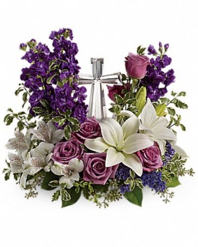 <div class="m-pdp-tabs-description">
<div id="mark-2" class="m-pdp-tabs-marketing-description">A bouquet to remember. This glorious garden of roses, lilies and alstroemeria surrounds a gleaming Crystal Cross. It's a radiant, reverent expression of faith that will be appreciated for years to come.</div>
</div>
<p id="arrngDescp">Lavender roses, white asiatic lilies, white alstroemeria, purple stock and purple seafoam statice are arranged with fresh pitta negra, seeded eucalyptus and lemon leaf. Delivered with a Crystal Cross keepsake.</p>