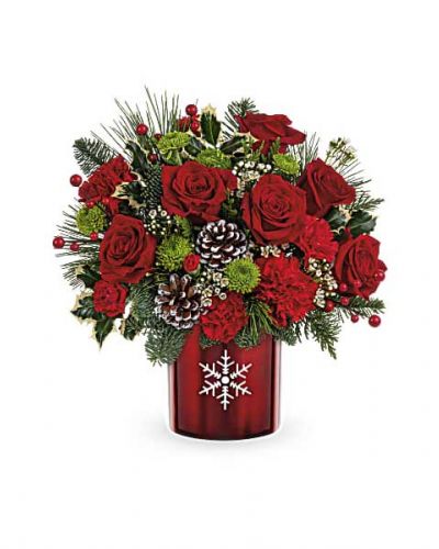 <div id="mark-3" class="m-pdp-tabs-marketing-description">Make their holidays merry and bright with this classic Christmas carnations bouquet in a shimmering metal vase with charming snowflake cutout. Later, it's lovely as a votive! These holiday flowers are sure to deck your halls right!</div>
<div></div>
<div id="desc-3">This Christmas flower arrangement includes red carnations, miniature red carnations, green button spray chrysanthemums, white waxflower, cedar, noble fir, white pine and variegated holly. Delivered in Teleflora's Stunning Snowflake Cylinder.</div>