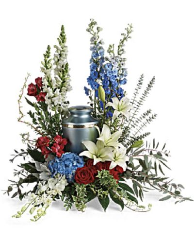 <div class="m-pdp-tabs-description">
<div id="mark-1" class="m-pdp-tabs-marketing-description">Proud and patriotic, this boldly designed red, white and blue bouquet displays the cremation urn with honor.</div>
</div>
<p id="arrngDescp">This patriotic tribute includes blue hydrangea, white dendrobium orchids, red roses, white asiatic lilies, red alstroemeria, red carnations, blue delphinium, white snapdragons, dusty miller, myrtle, huckleberry, variegated ivy, curly willow, aralia leaves, parvifolia eucalyptus, spiral eucalyptus, and lemon leaf.</p>
Arrangement does not include urn.