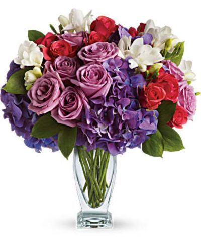 <div id="mark-3" class="m-pdp-tabs-marketing-description">She'll wax poetic over this posh purple presentation! A unique mix of colors and textures make this a stunning gift for any occasion and anyone - especially those who prefer purple!</div>
<div id="desc-3">
<ul>
 	<li>Rich purple roses and hydrangea are playfully contrasted with hot pink roses and fragrant white freesia in an angular glass vase.</li>
</ul>
</div>