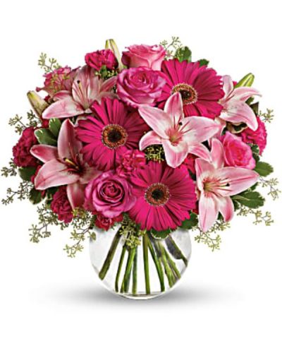 <p>Sometimes all you need is a little pink me up! An ideal pick for anyone whose favorite color is pink, this stylish mix is full of variety and comes presented in a clear glass bubble bowl they'll use again and again.<br />
A wide variety of flowers including pink roses, pink asiatic lilies, hot pink gerberas, pink carnations and hot pink miniature carnations are mixed with fresh variegated pittosporum and seeded eucalyptus.</p>