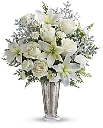 As enchanting as falling snowflakes, this dramatic yet graceful arrangement is a beautiful choice for an elegant evening celebration, winter ball centerpiece or to send silver anniversary wishes during the winter months.