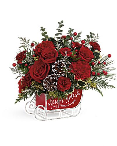 Dashing through the snow in a flower-filled open sleigh! Fun and festive, this vintage metal keepsake sleigh is the perfect vehicle for a joyful holiday bouquet.