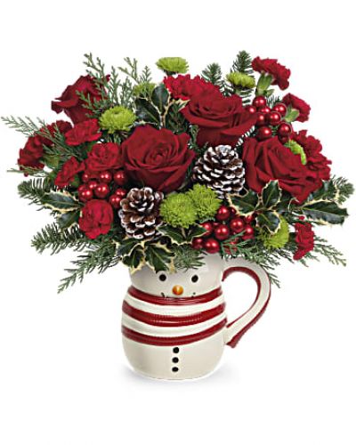 <div id="mark-3" class="m-pdp-tabs-marketing-description">Whether filled with festive flowers for Christmas or hot cocoa in the New Year, this smiling sweet frosty snowman mug vase spreads whimsical winter cheer. Order these Christmas flowers and put a smile on your loved one's face.</div>
<div></div>
<div id="desc-3">Red carnations, miniature red carnations and green button spray chrysanthemums are arranged with noble fir, cedar and variegated holly. This Christmas bouquet is delivered in Teleflora's Send a Hug® Sweet Frosty Mug.</div>