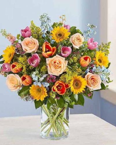 There’s so much to love about spring…but it’s the bright, beautiful blooms that make it truly sensational! Our luxurious bouquet is gathered with a garden-fresh mix in shades of pink, blue, yellow and peach. Artistically designed, this gift delivers the best part of the season right to their door.